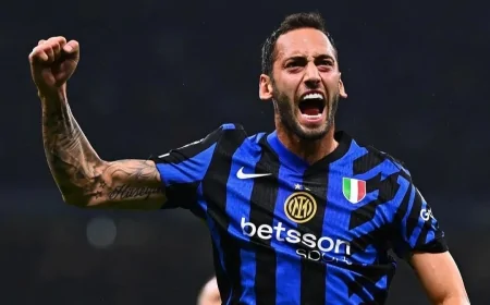 Coppa Italia: Abraham e Calhanoglu Protagonisti nel Derby Milanese